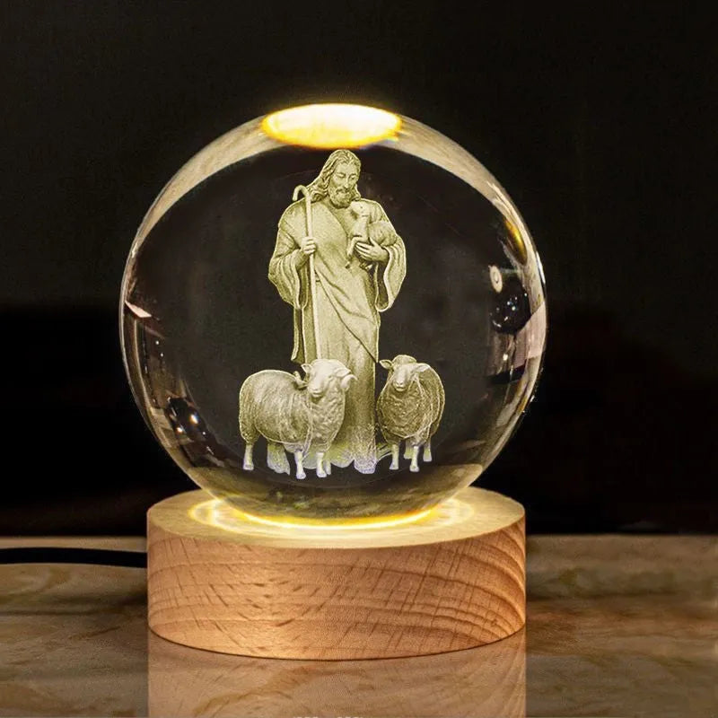 White crystal ball ornament with solid wood warm light base on desk surface