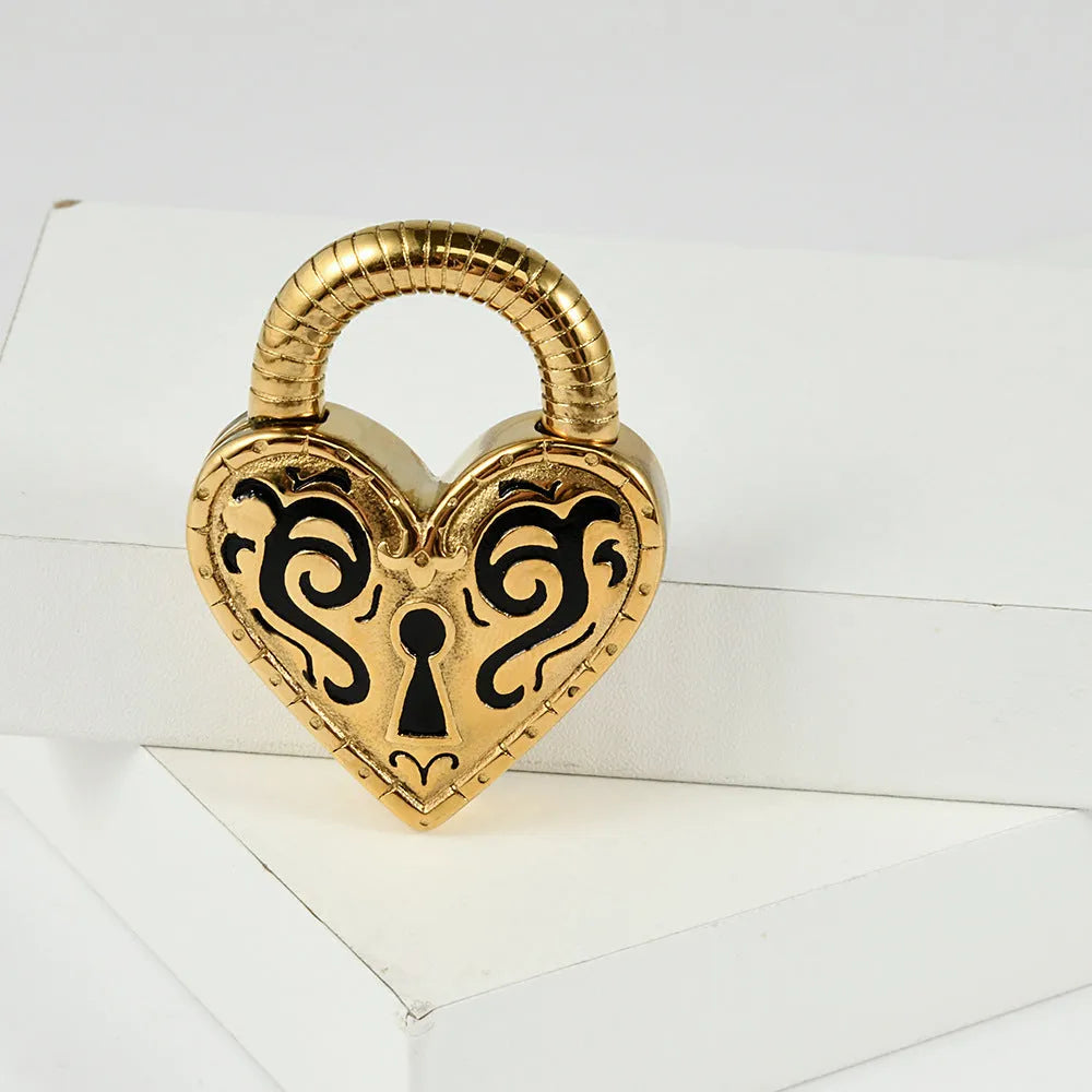 Heart-shaped stainless steel earring in steel colour close-up showing electroplated finish.