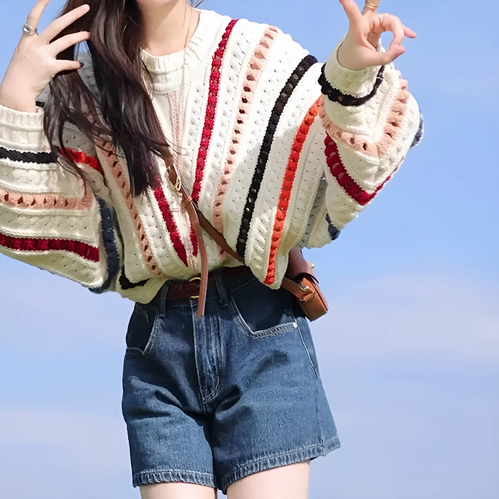 Rainbow striped batwing sleeve sweater with hollow knit construction in loose fit