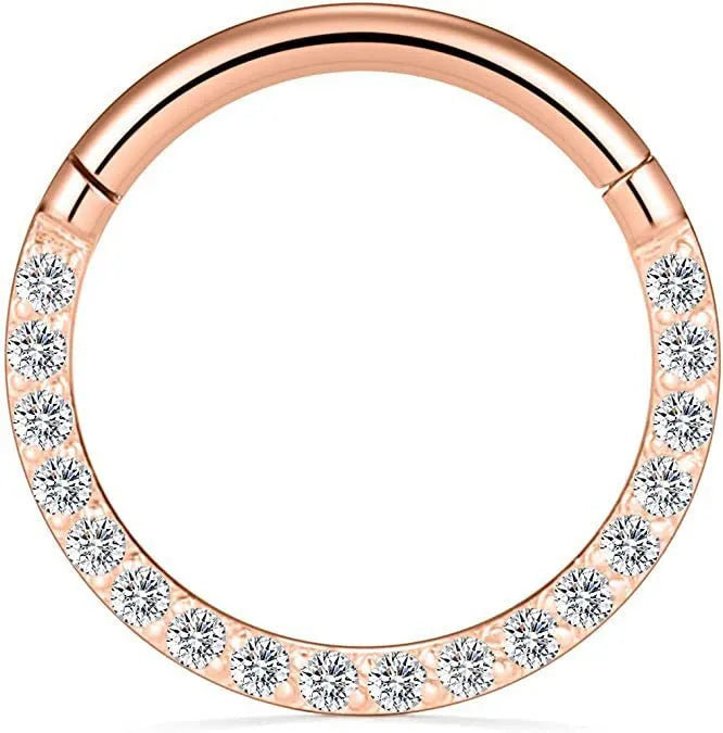A round, seamless nose ring made of stainless steel, shown in various electroplated colour finishes including gold, rose gold, and black.