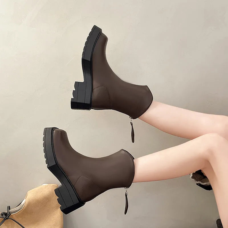 Black square toe platform ankle boots for women with a back zipper and chunky heel.