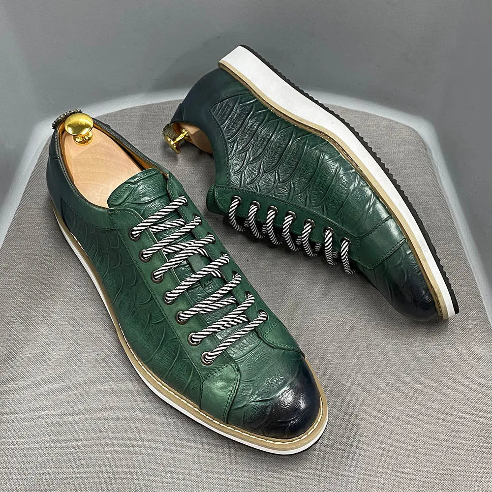 Men's low-top handmade shoes with an embossed pattern, shown in multiple colours with front lace-up detail.