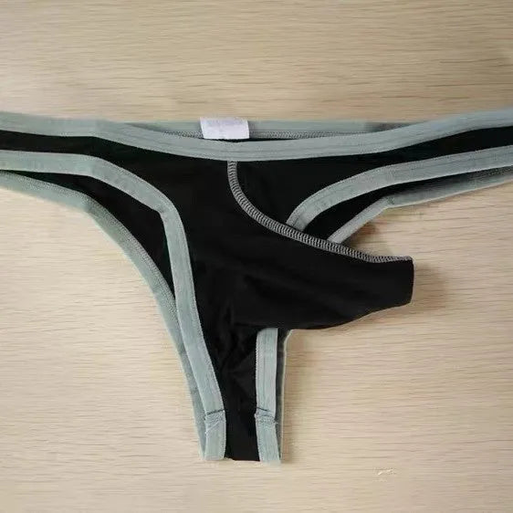 Men's white nylon ice silk small briefs with elephant nose style cut on a flat lay.