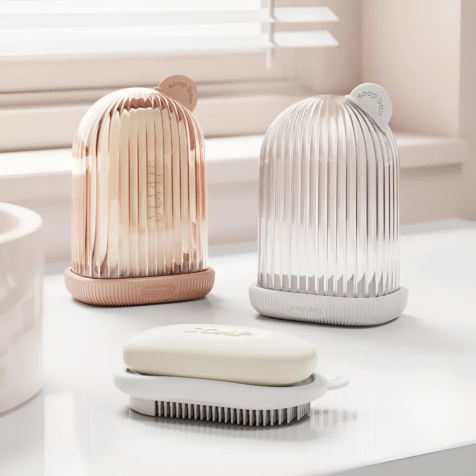 Lightweight PET travel soap holder in cream white, pink, and white colours