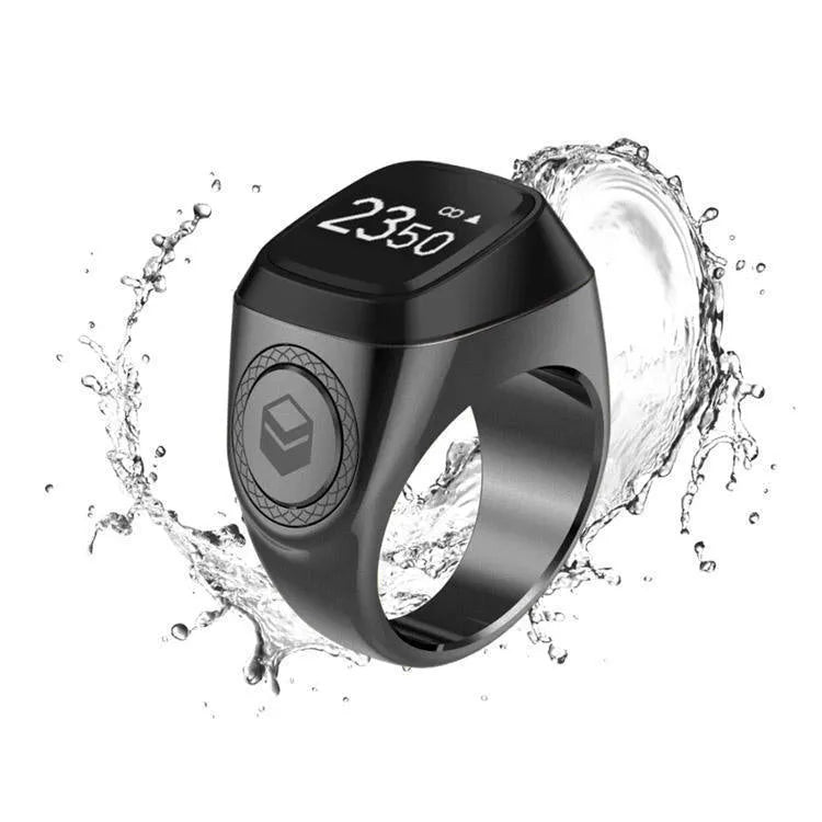 Zikr1 silver metal smart ring for Tasbih counting on a finger, showing its OLED display and single button.