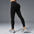 Women's peach hip tight yoga pants in mid waist design with quick-drying cotton blend fabric