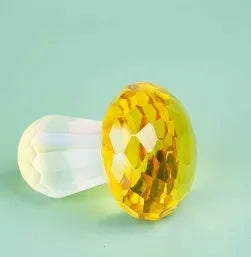 Colourful crystal mushroom decoration in geometric style measuring 40mm by 53mm