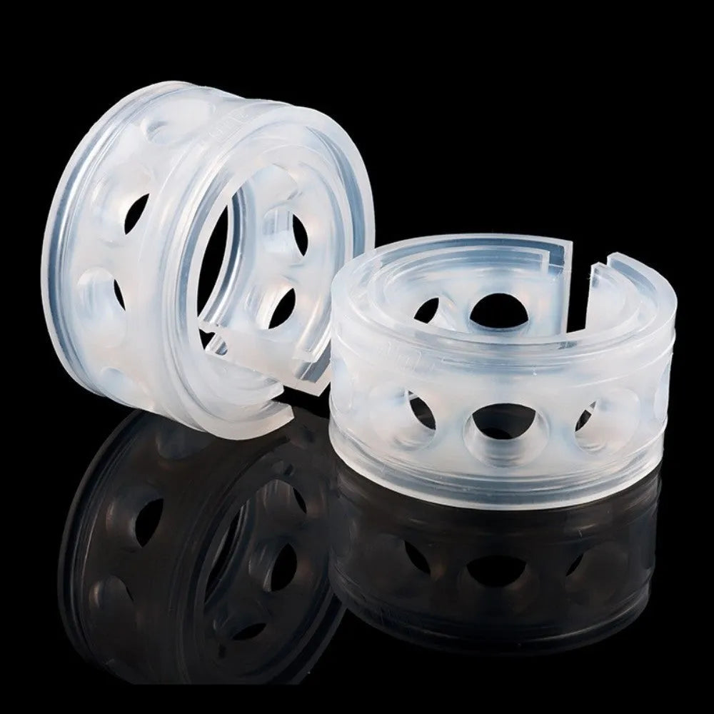 Transparent rubber shock absorber buffer for car suspension springs, shown in multiple sizes.