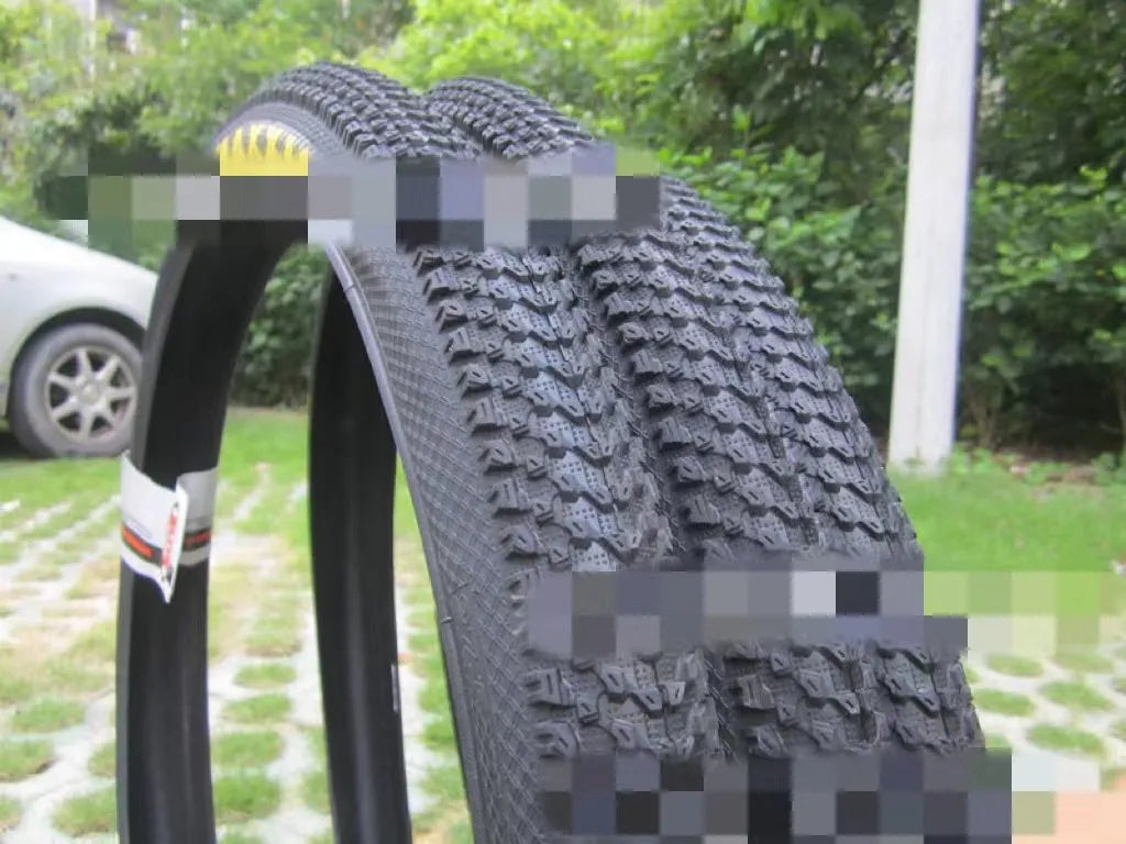 Mountain bike ultralight puncture proof tyre showing tread pattern, available in multiple wheel sizes.