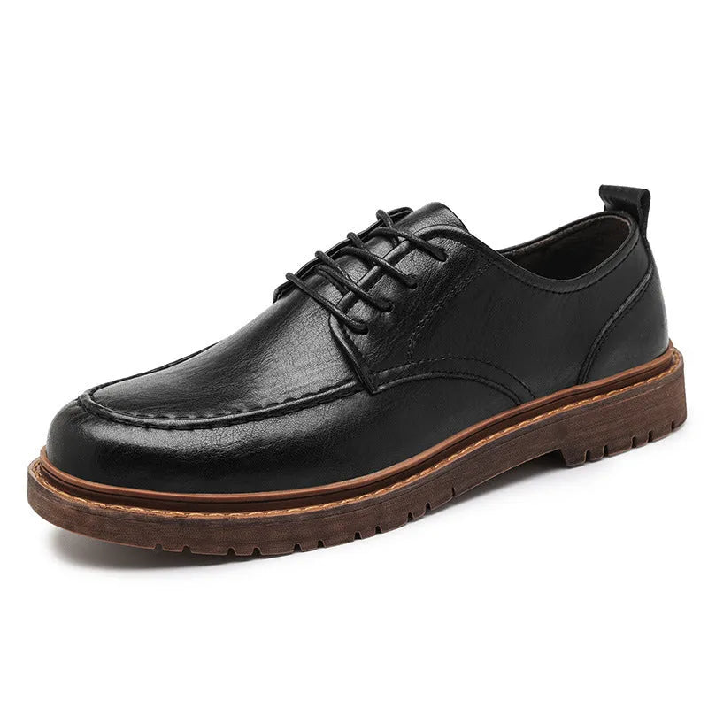 Men's tooling casual leather shoes in black, round toe low top with stitching details on rubber sole