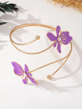 Alloy hollow armband bracelet with decorative pattern in pink or purple colour