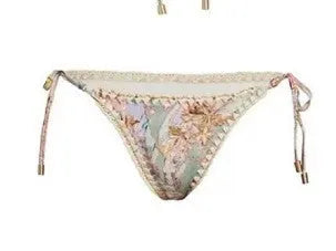Women's creamy white floral bikini set with briefs and skirt on nylon fabric