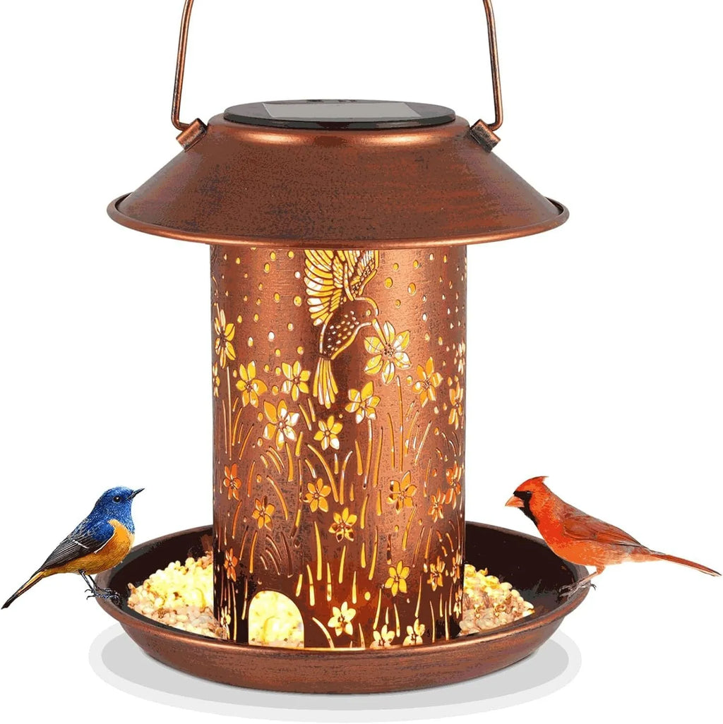 Cast iron solar bird feeder with hummingbird pattern and integrated LED lighting for outdoor garden use