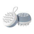 A soft silicone pet bath brush and massage comb in yellow, showing both the combed hair head and the 3D massage head.