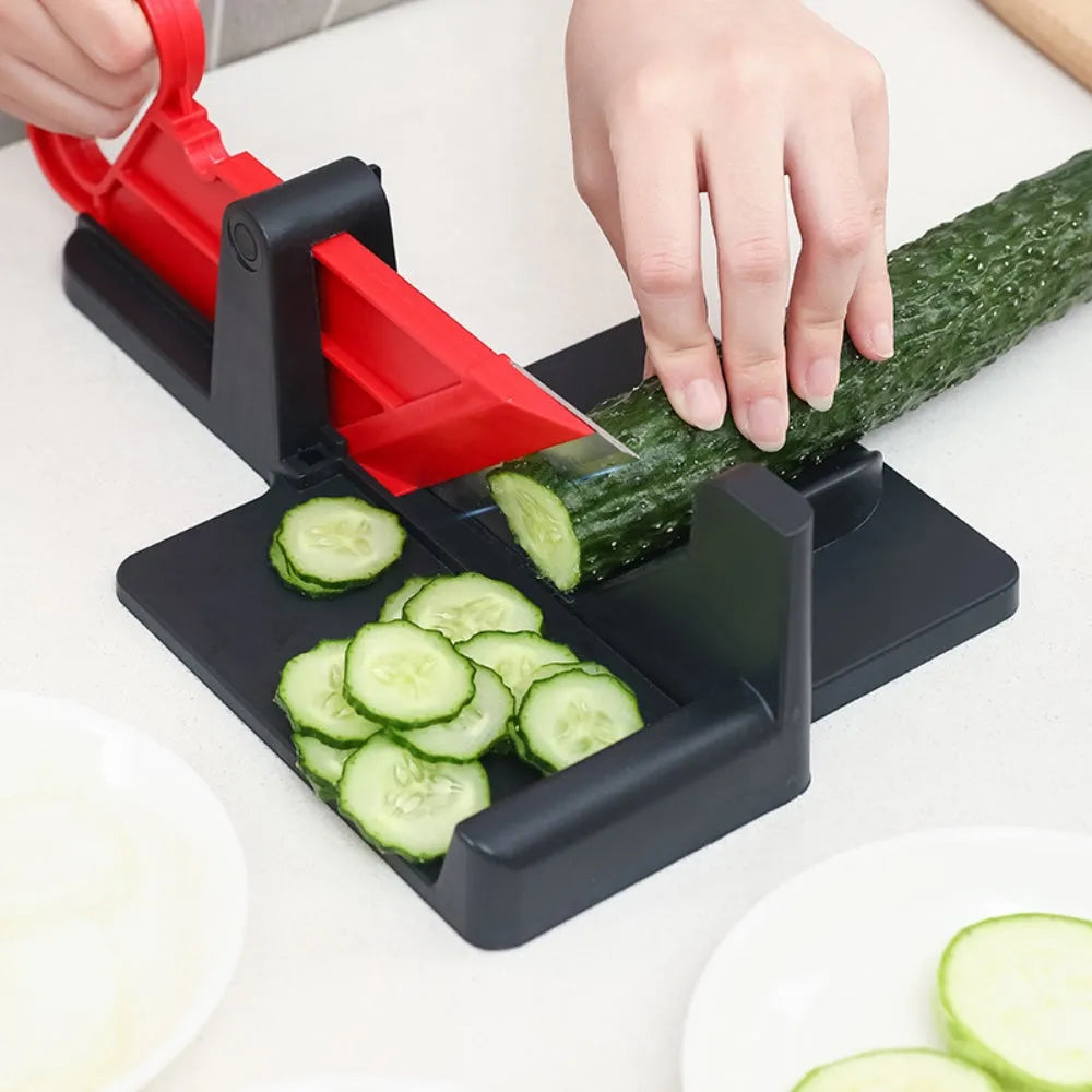 Green multifunctional vegetable cutter on a kitchen counter with stainless steel blade and plastic body