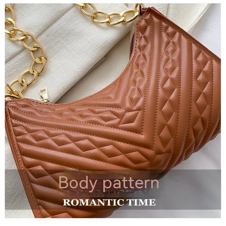 Pleated chain strap baguette shoulder bag in vertical square shape with soft PU leather exterior
