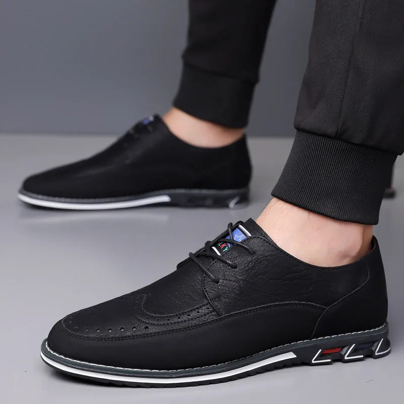 Men's casual leather slip-on shoes showing leather toe cap and sewing line detailing
