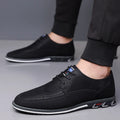 Men's casual leather slip-on shoes showing leather toe cap and sewing line detailing