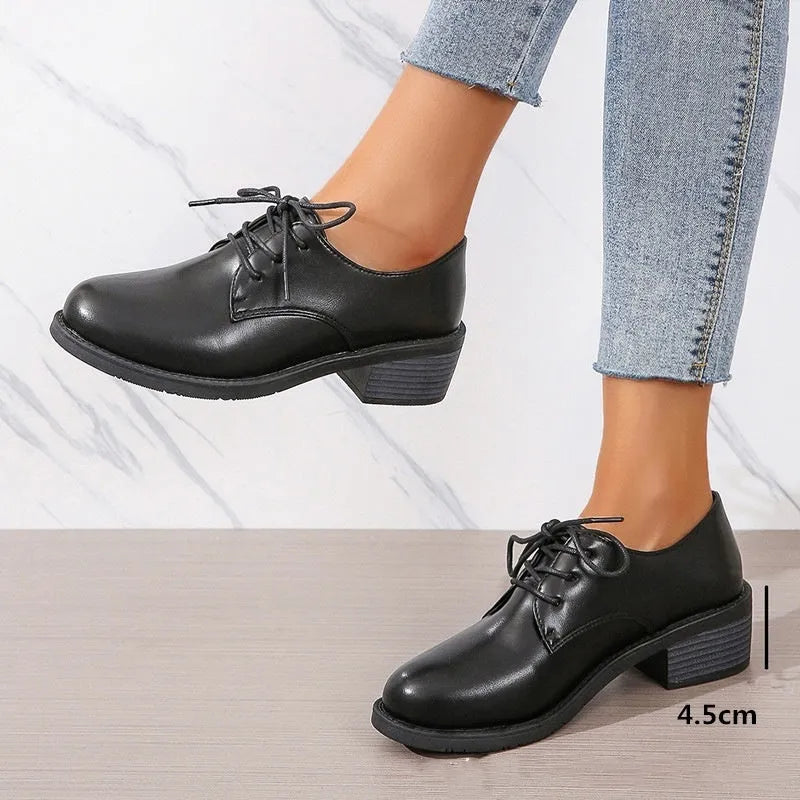 Black women's work shoes with chunky heel and soft sole for professional wear
