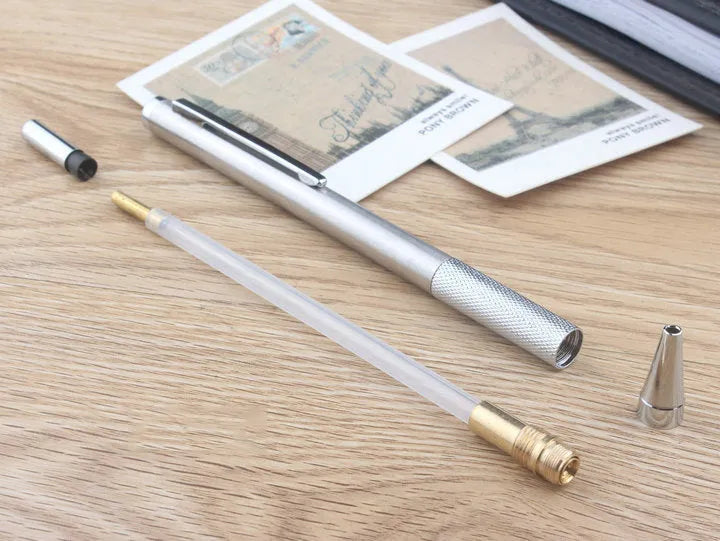 Metal automatic mechanical pencil with 2B graphite refill showing lead size options