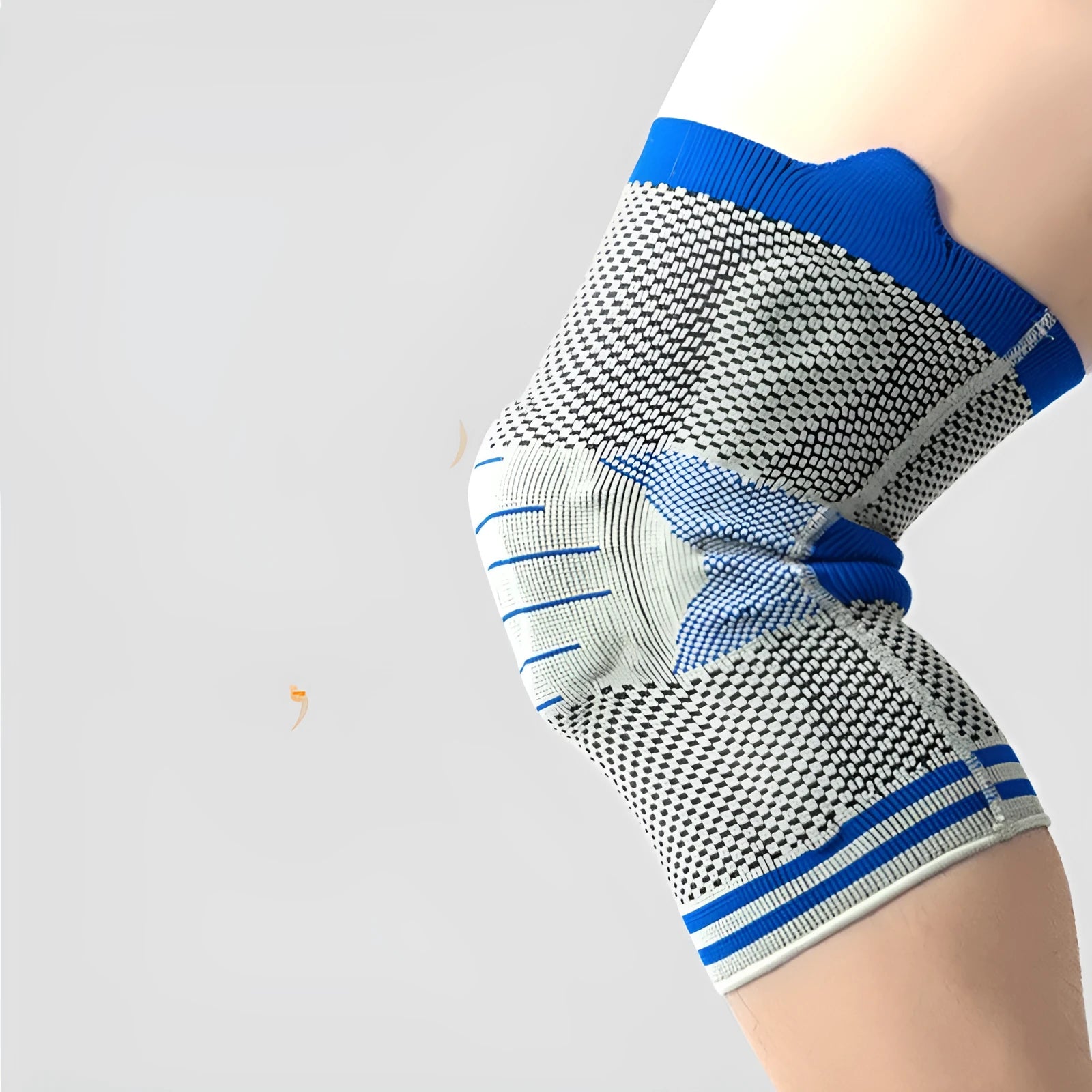 Cotton knee pad with silicone shock absorber spring bar in grey and blue colour, shown from the side.