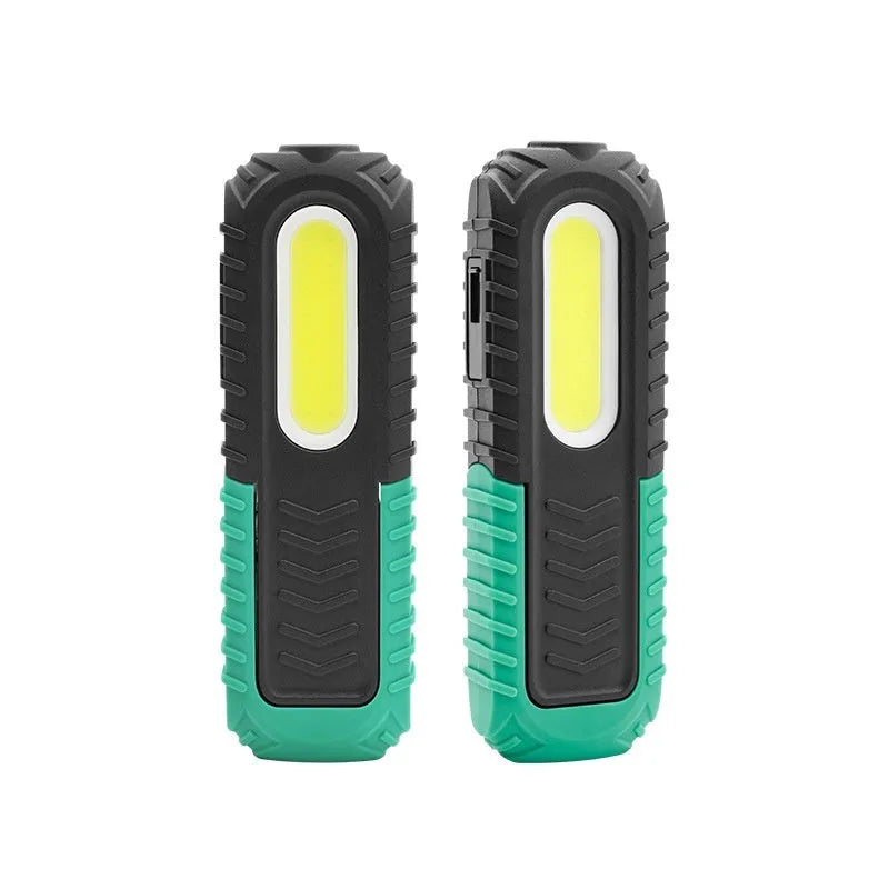 Black and green USB-charging auto repair work light with compact handheld design