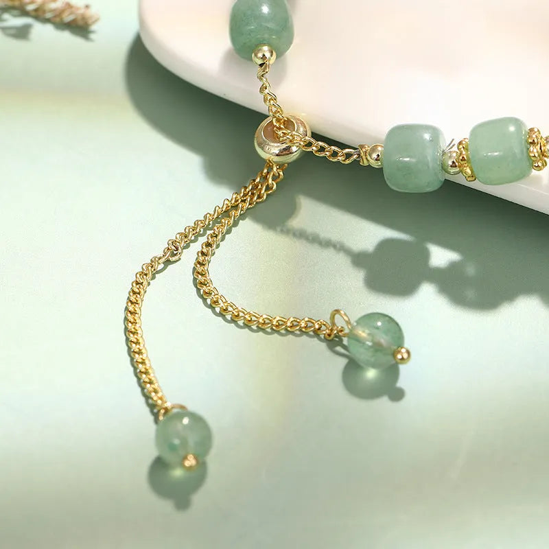 Women's casual rabbit bracelet with green aventurine natural stone beads and copper plated metal with 14k gold accents