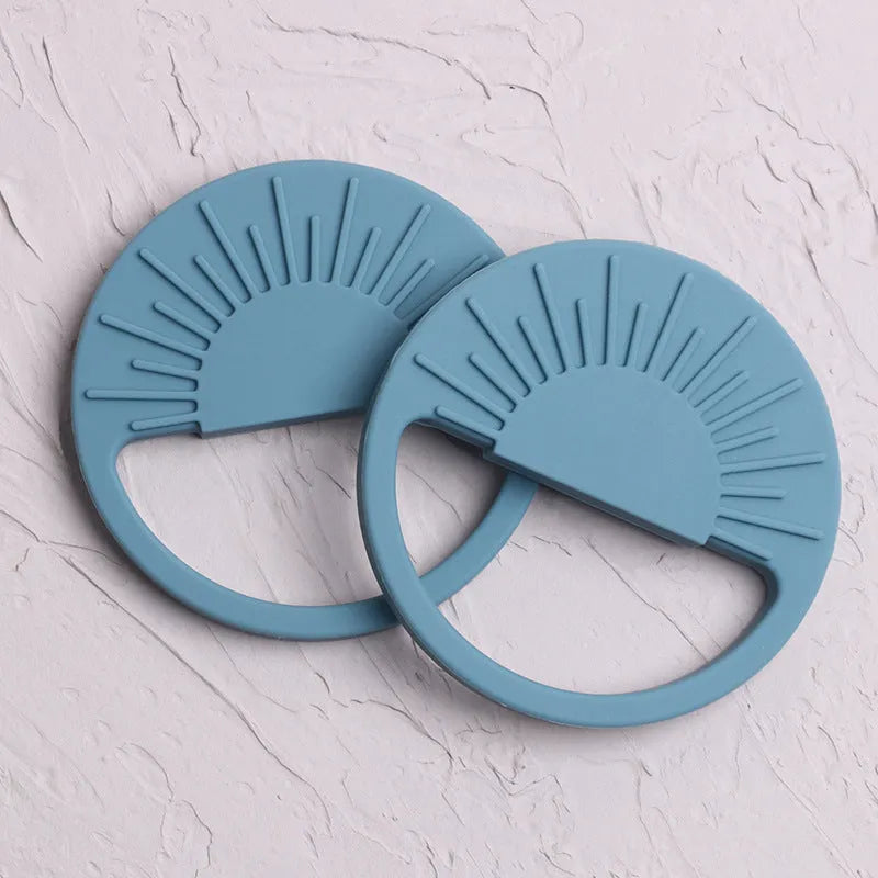 Silicone baby teether toy 88x88mm in lilac on light background