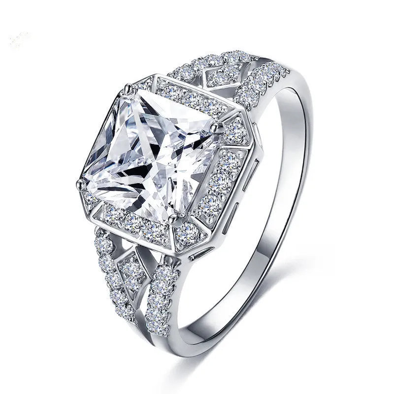 Geometric women's zircon ring with hollow ornamentation in platinum colour