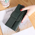 Women's long tri-fold wallet in light grey PU leather with sewing thread detail, open to show multiple card slots and cash compartments.