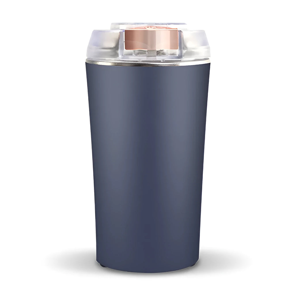Blue mini flour mill and grinder machine for making seasoning powders on a kitchen counter.
