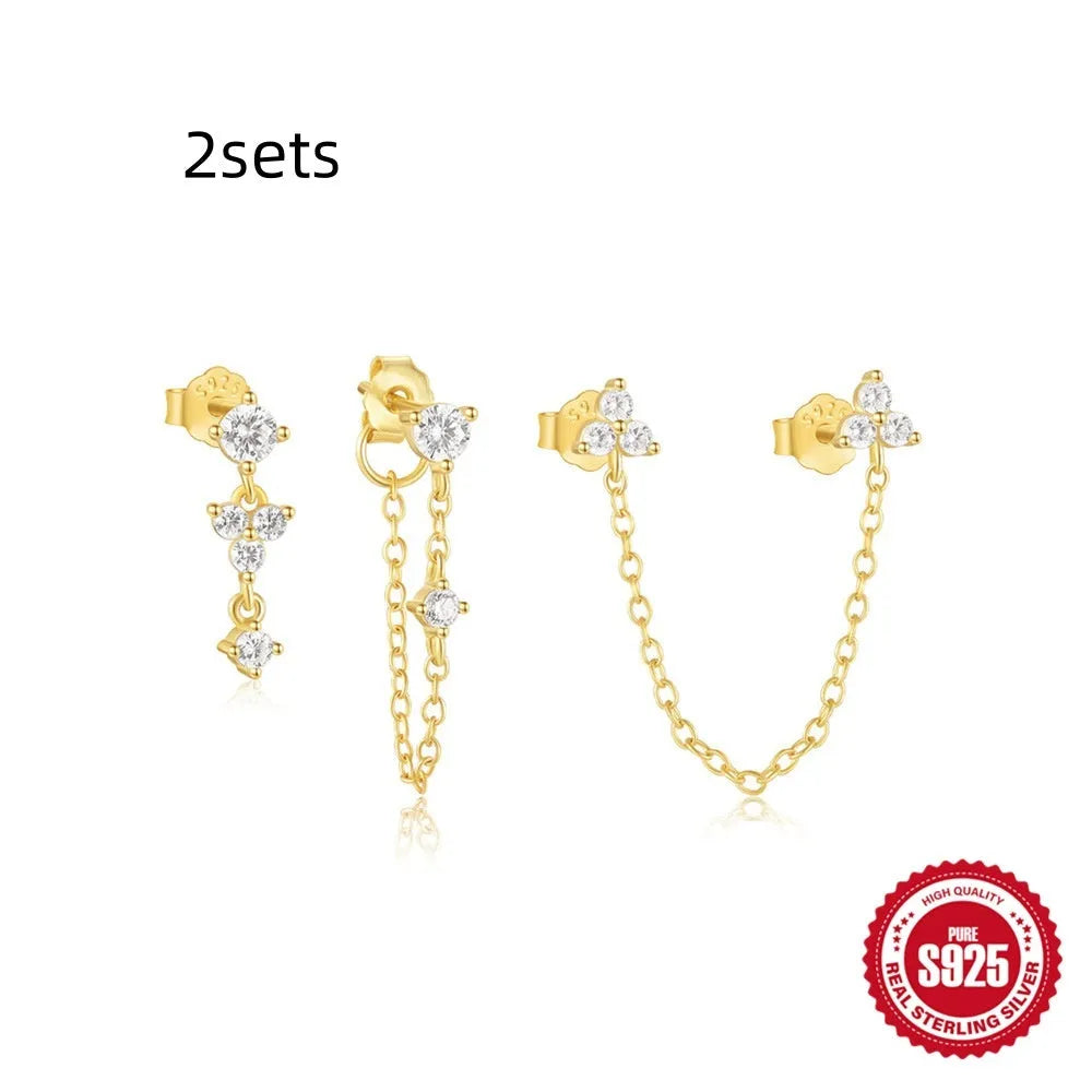 Set of four geometric S925 Sterling Silver drop earrings with zircon and gold-tone finish.