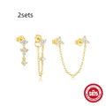 Set of four geometric S925 Sterling Silver drop earrings with zircon and gold-tone finish.
