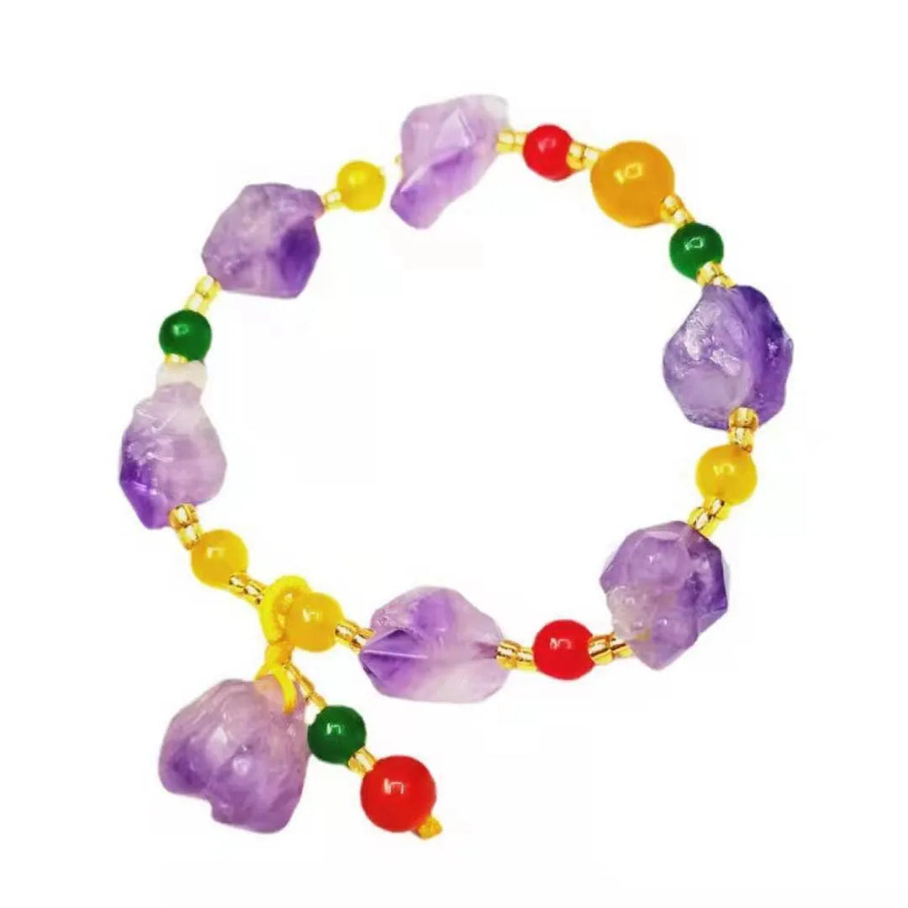 Natural shaped purple amethyst gemstone bracelet with a carved Fu character charm.