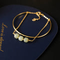 Hetian jade lucky beads bracelet with gold inlay, shown in single, double, and three bead versions.