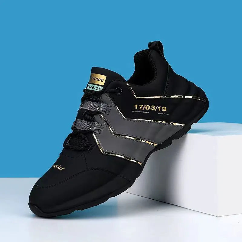 Low-top casual sneaker with thick plastic sole and mesh lining in grey and black colourway.