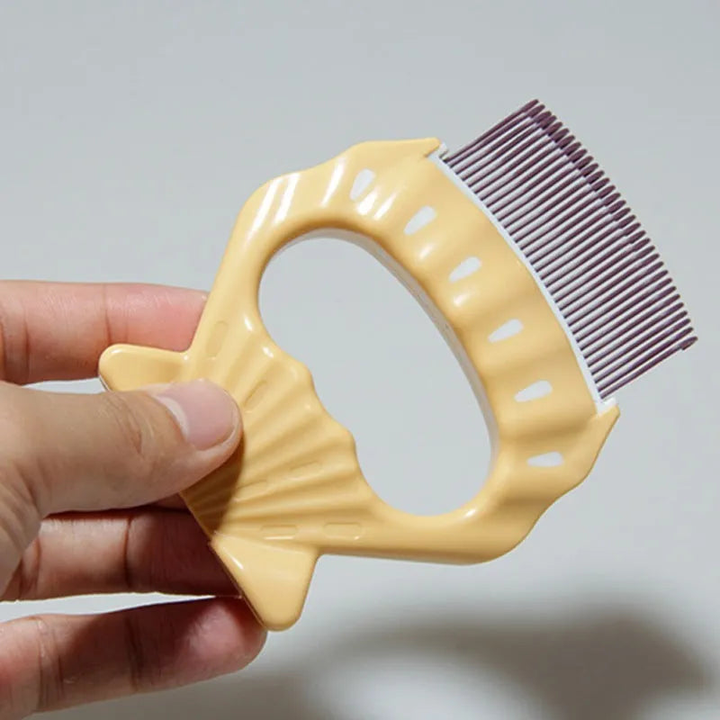 Shell shaped pet grooming brush in green, orange, or purple colours for dogs and cats