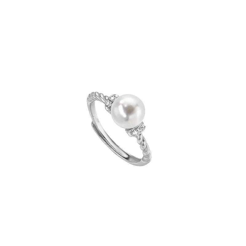 Adjustable copper ring with geometric pearl inlay in antique twist design
