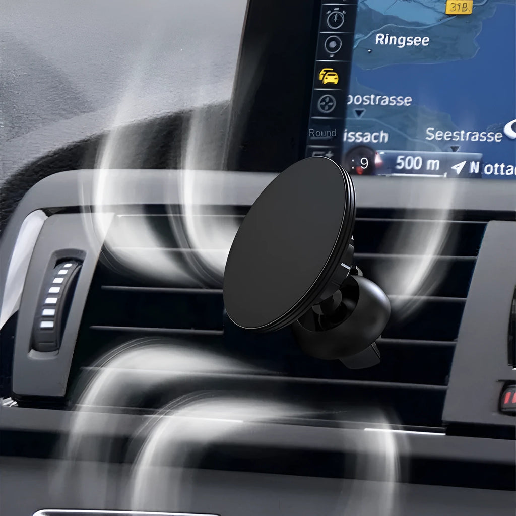 Black aluminium alloy magnetic car phone holder attached to car air vent