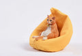 Lazy cat ornament with sofa, a 7.5cm high resin diorama for car dashboard or shelf.