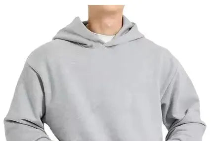 Man wearing a solid-colour fleece-lined cotton hoodie with wool lining.