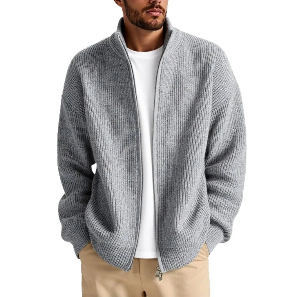 Man wearing a loose fit grey cardigan sweater for casual leisure wear