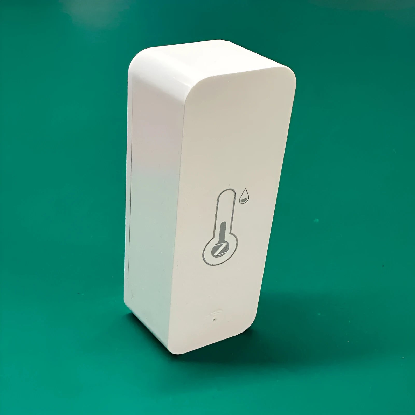 WiFi Zigbee temperature and humidity sensor in white ABS plastic casing showing digital display