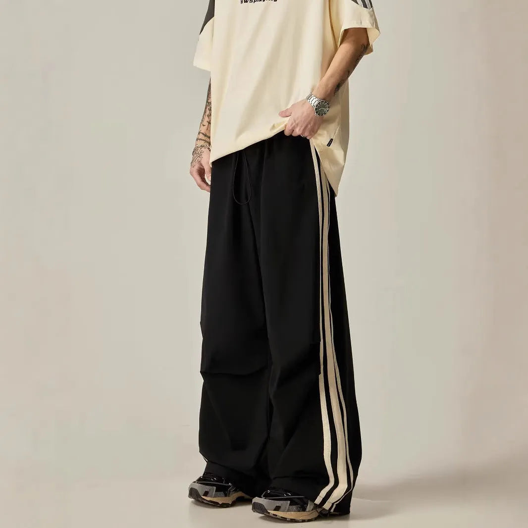 Men's black wide leg climbing pants with high waist and straight-leg design