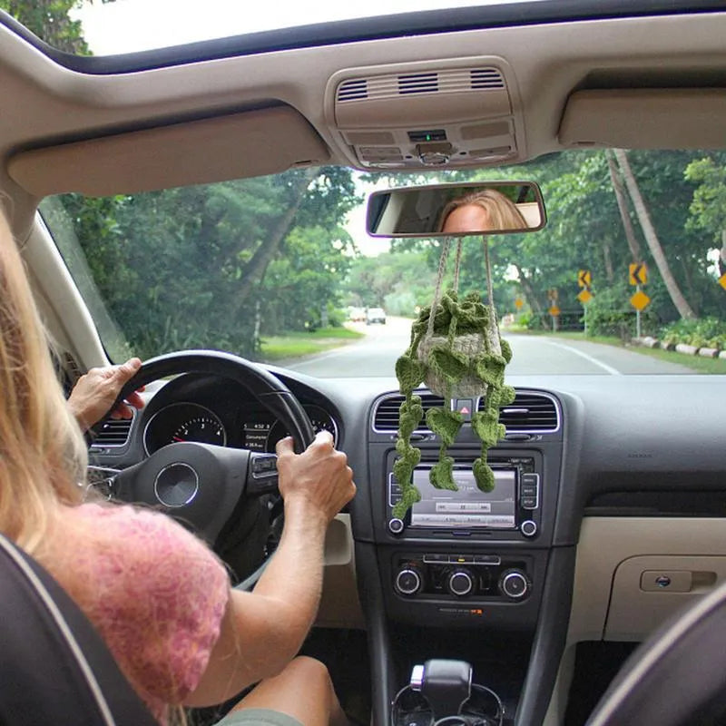 Green and white knitted wool car plant decoration with 25cm hanging rope on car dashboard