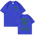 Front view of a loose-fit linen T-shirt featuring a printed 'Rise And Grind Green Coffee' cartoon design in black on a light-coloured fabric.