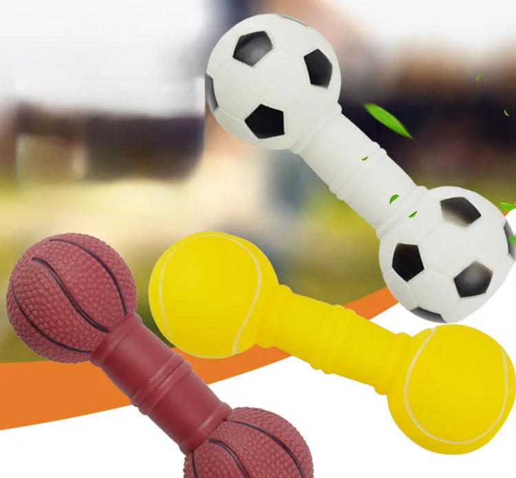 Colourful PVC football dumbbell shaped dog toy on a plain background.