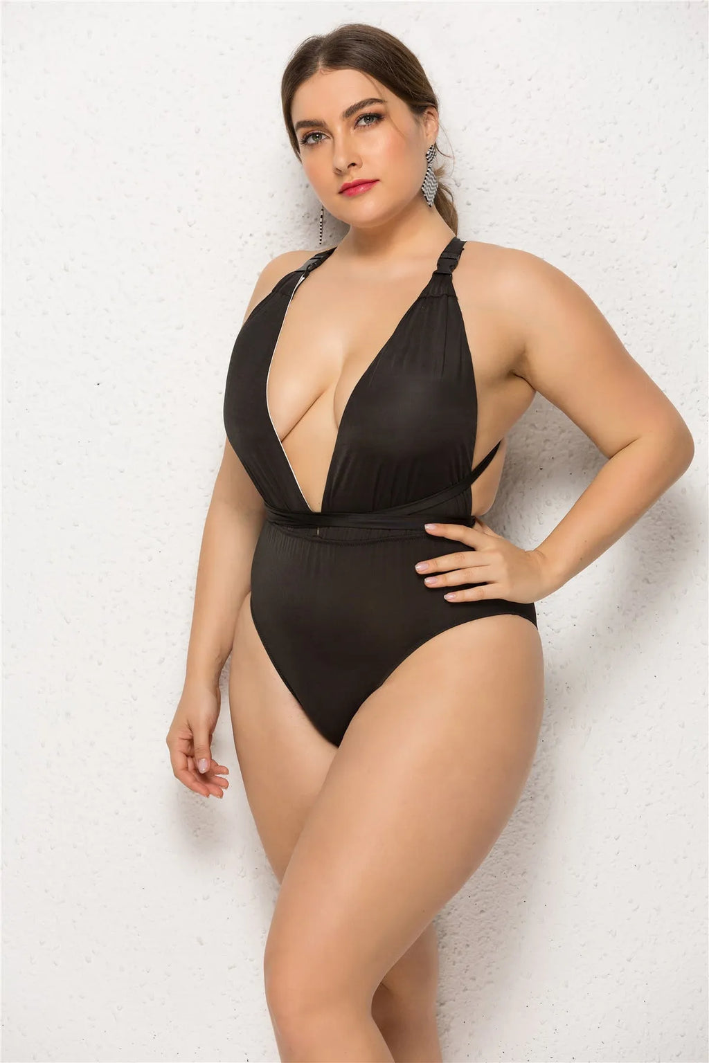 Plus size woman in black high elasticity backless one-piece swimsuit with chest pad solid colour for swimming fitness