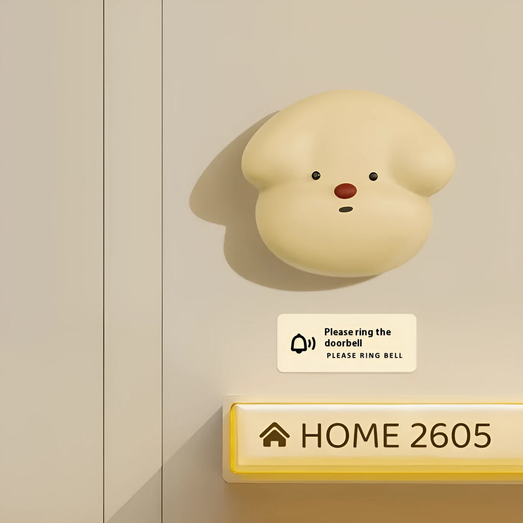 Wireless plug-in doorbell for household use in milky yellow or white colour with self-generating beeper mechanism