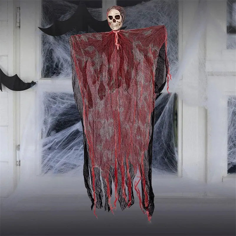 Halloween hanging ghost pendant with dyed blood effect skull decoration on a tree branch